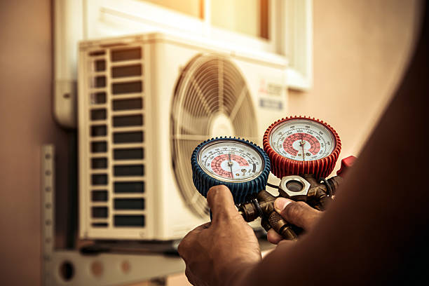 Professional Heat Pump Repair technician working in Grants Pass, OR
